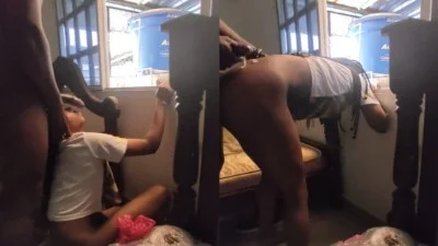 African NRI couple standing fuck in window